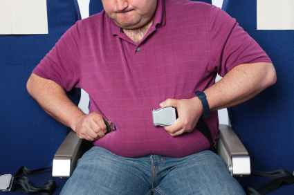 Airline Policies for Overweight Passengers Traveling this Summer